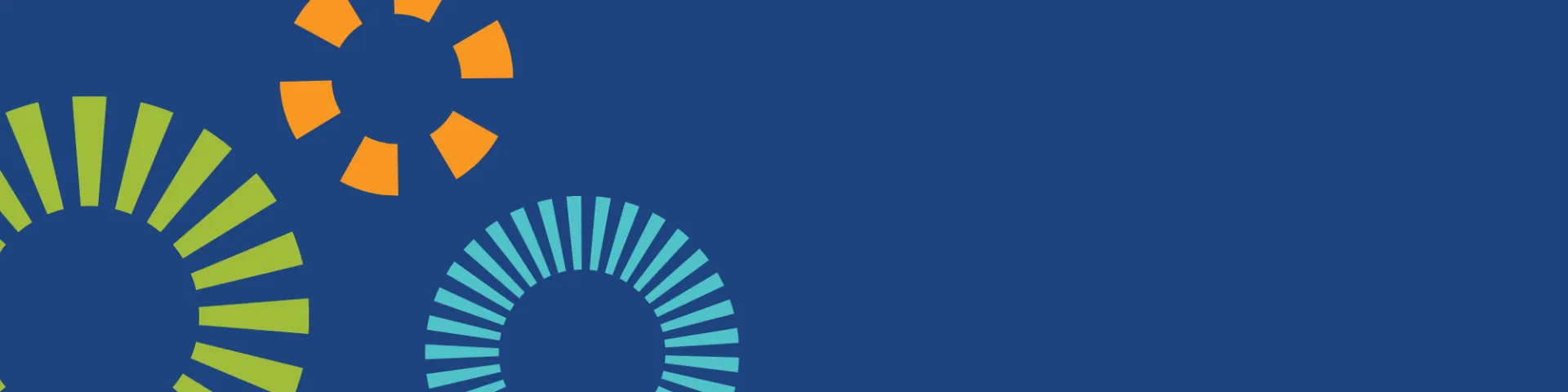 A banner with three of the spherical shapes in green, orange and turquoise on a dark blue background. 
